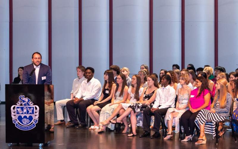 SFIRC Alumnus Cameron Dawson addresses 2025 scholarship recipients at Awards Ceremony